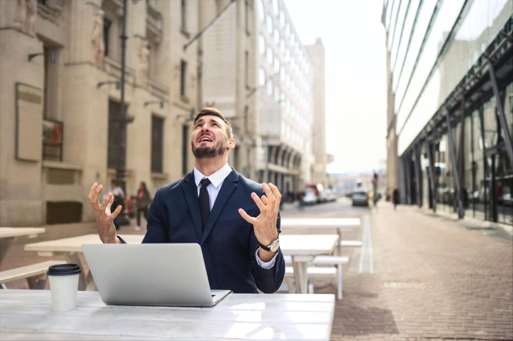 frustrated man at laptop